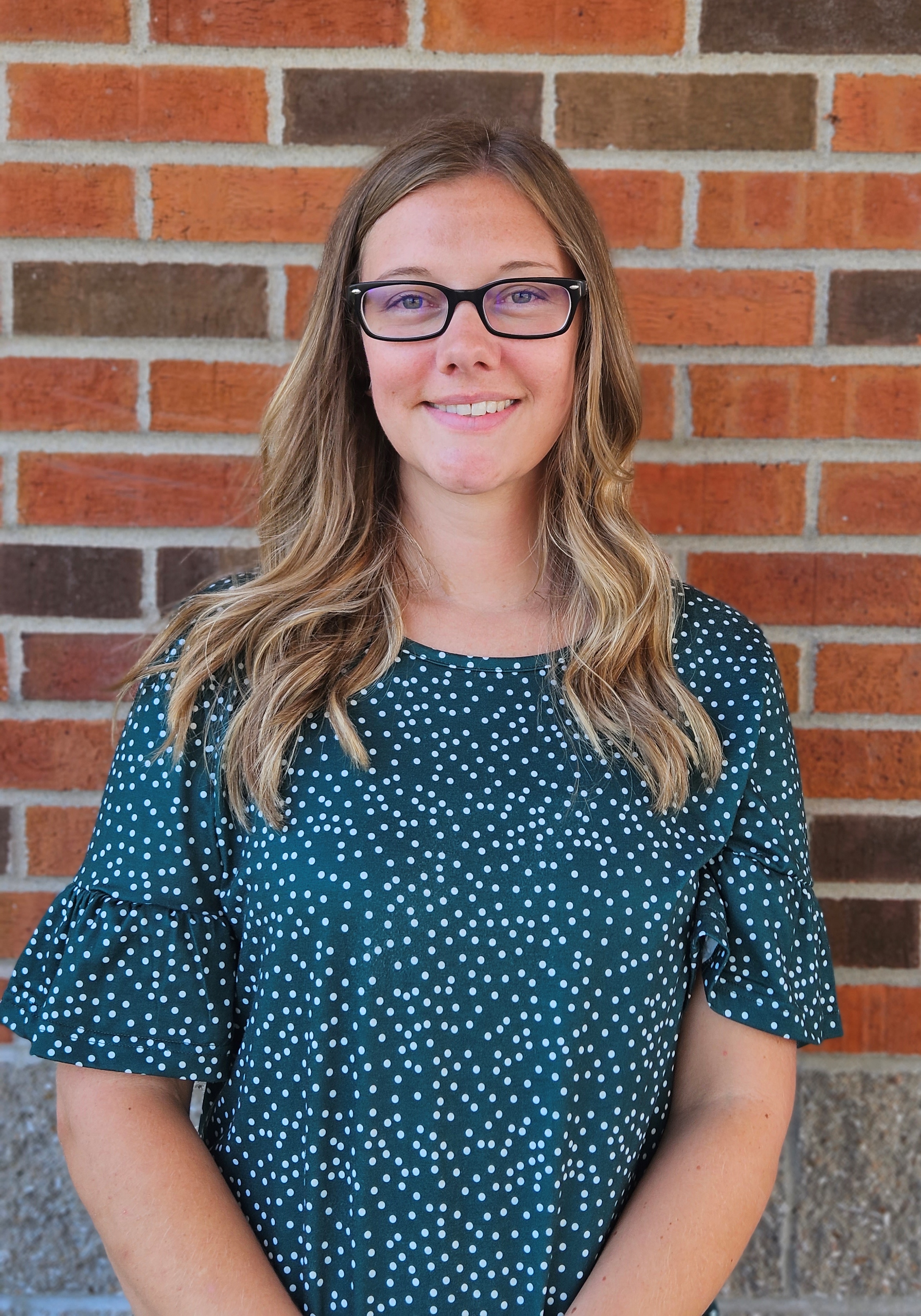 Caitlin Volkmann, Office Coordinator